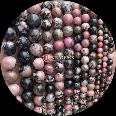 pierre précieuse de forme ronde Howlite Rohdonite pierre cristalline