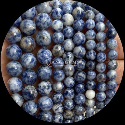 pierre précieuse de forme ronde Howlite Rohdonite pierre cristalline