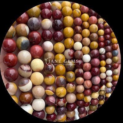 pierre précieuse de forme ronde Howlite Rohdonite pierre cristalline