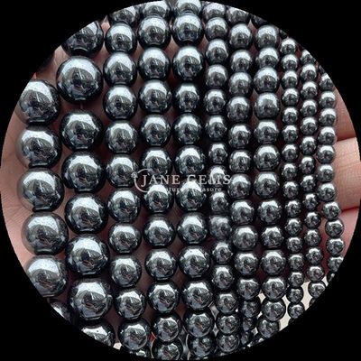 Perles de pierre précieuse polissées de 8 mm hématite yooperlite et autres types de pierre de guérison en cristal
